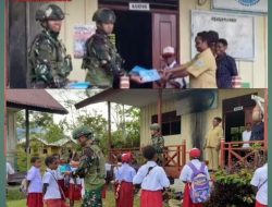 Satgas Yonif 521/DY Bagikan Buku dan Alat Tulis Kepada murid SD